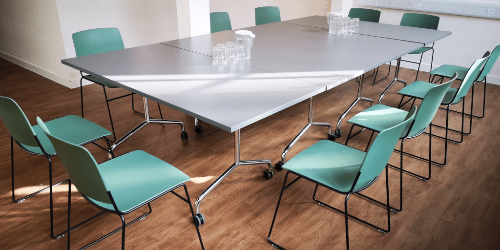 Wee Duncan room set in boardroom style, sunlight across the table